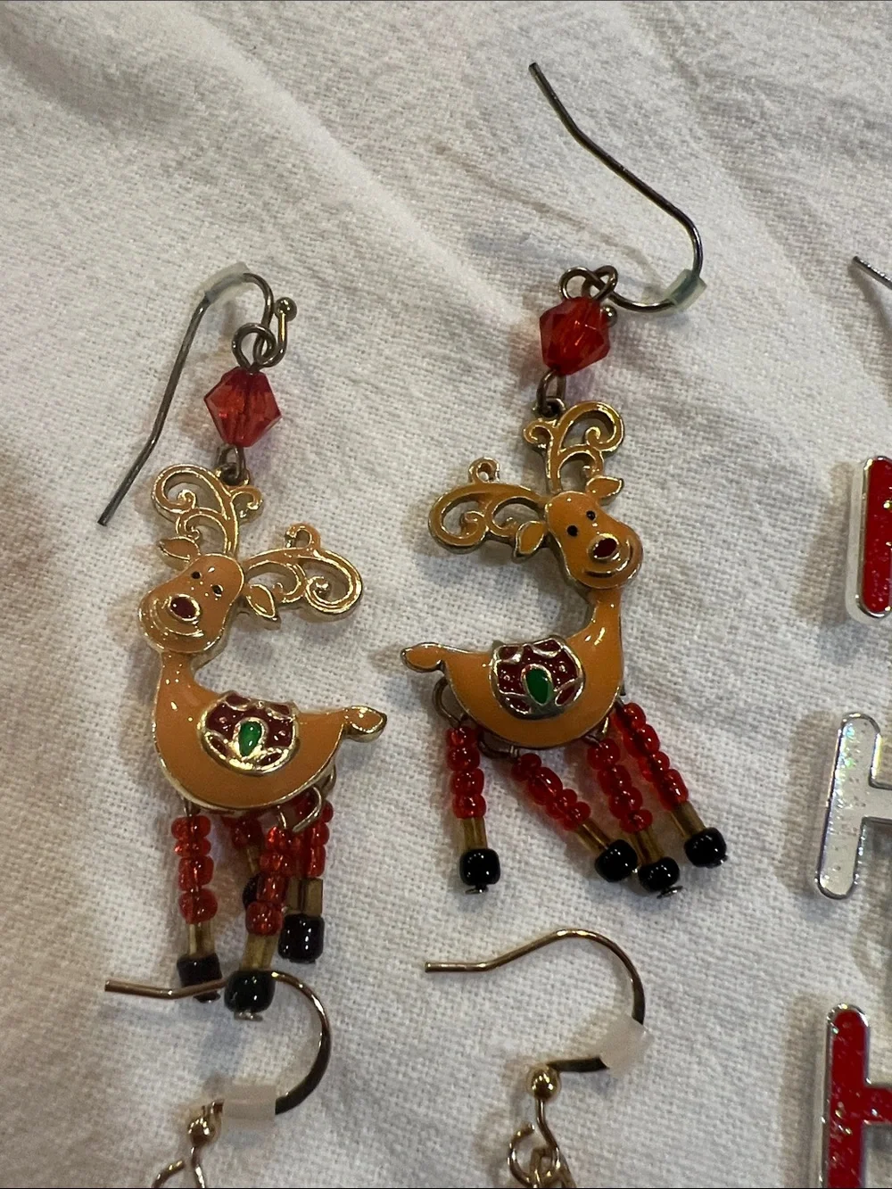 4 Sets of Christmas Earrings.